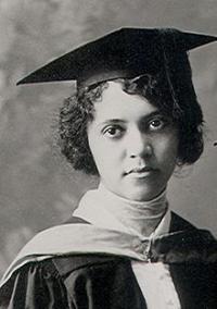 Black and white photograph of Alice Ball in a graduation cap and gown
